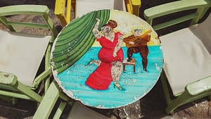 old wooden taverna table painted in hydra island greece