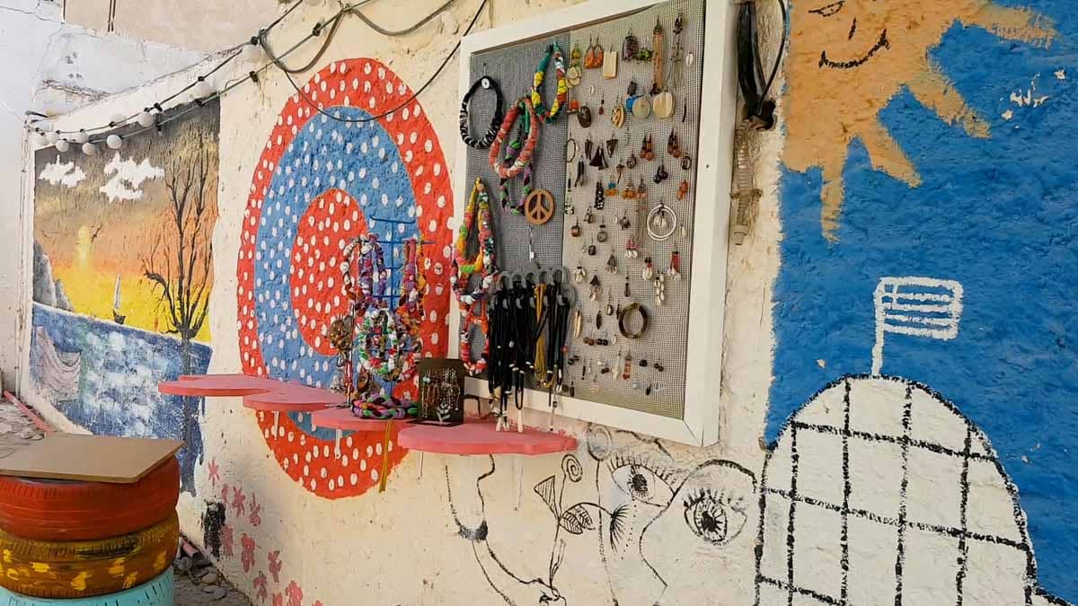 Wall paintings and hippie jewellery in Matala